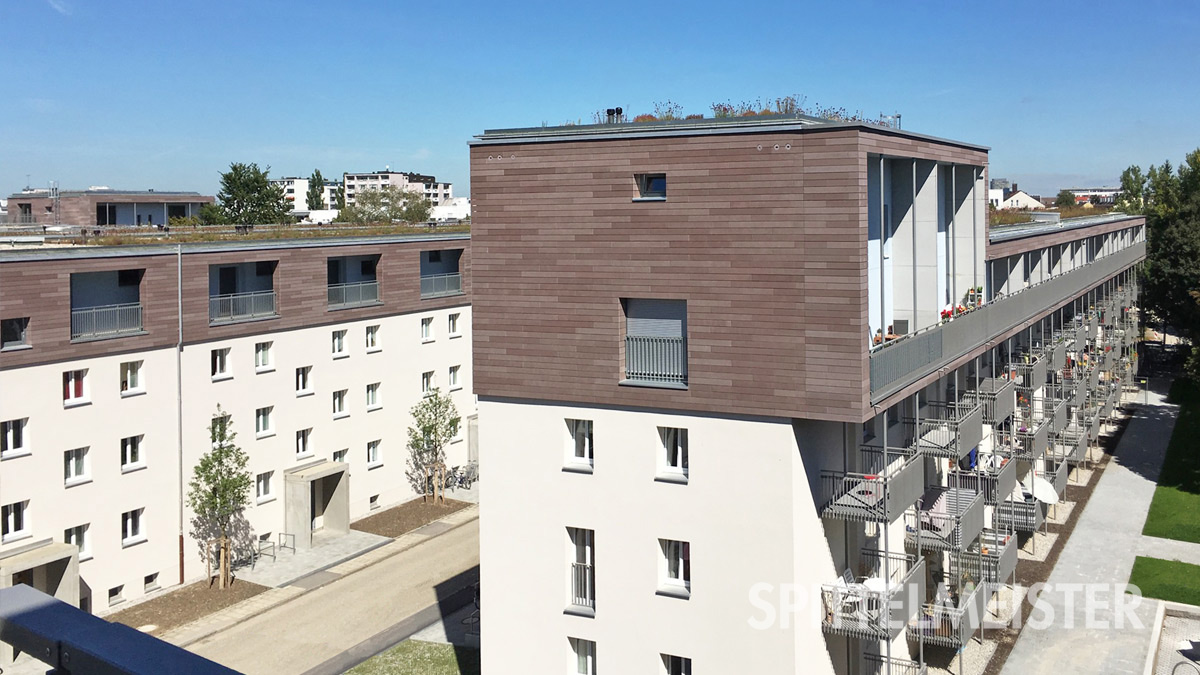 Aufstockung Bestandsgebäude in München neue Alubalkone von Spittelmeister